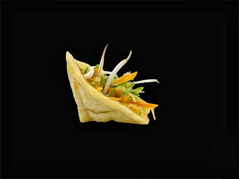 Malay cuisine or Stuffed Tofu called Tauhu sumbat on black background