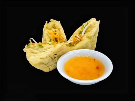 Malay cuisine or Stuffed Tofu called Tauhu sumbat on black background