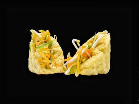Malay cuisine or Stuffed Tofu called Tauhu sumbat on black background