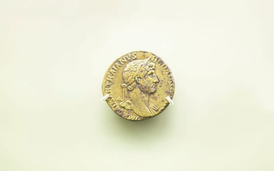 Merida, Spain - August 25th, 2018: Hadrian Roman Emperor coin, National Museum of Roman Art in Merida, Spain