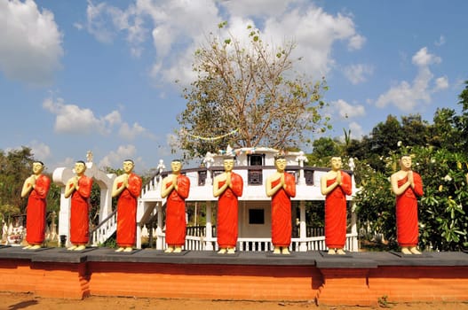 Disciples of Buddha statues at Kimbissa temple near Sigiriya Rock Fortress, Sri Lanka