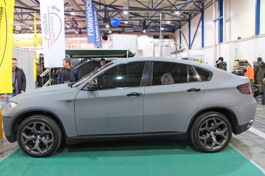 Modern BMW car in gray color is presented at exhibition in Kiyv. German brand auto BMW