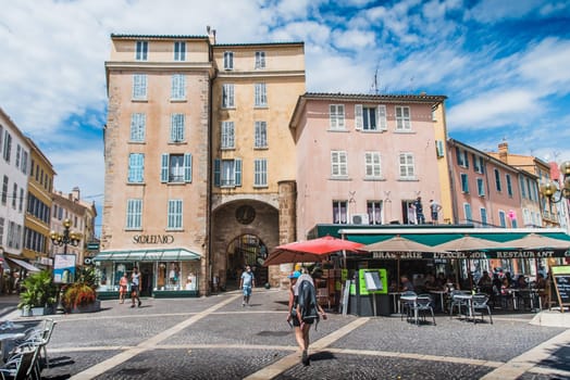 Porte Massillon and café terraces in Hyères in France