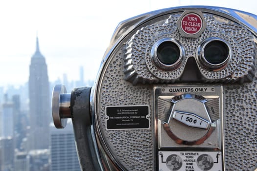 The prospects before and after an election in the USA with the coin binoculars in New York,Manhattan.