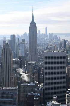 The famous view from Rockefeller Center of the Empire State Building and the southern tip of downtown in New York City,Manhattan.