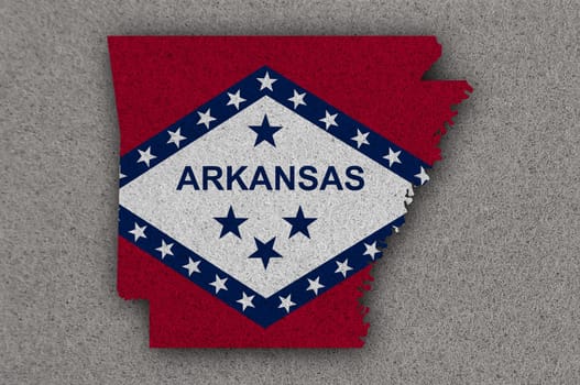 Map and flag of Arkansas on felt