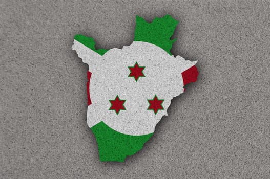 Map and flag of Burundi on felt