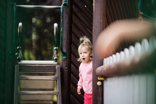 child to playgrounds, having fun