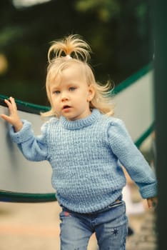 child to playgrounds, having fun