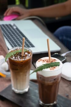 Coffee glass decorated with fern leaf, stock photo
