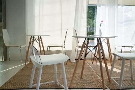 Table and seat in co-working space, stock photo