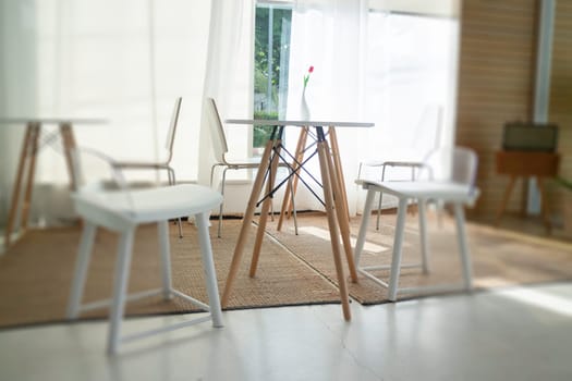 Table and seat in co-working space, stock photo
