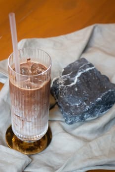 Glass of milk coffee on the table, stock photo