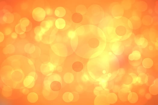 A festive abstract delicate golden yellow orange gradient background texture with glitter defocused sparkle bokeh circles. Card concept for Happy New Year, party invitation, valentine or other holidays.