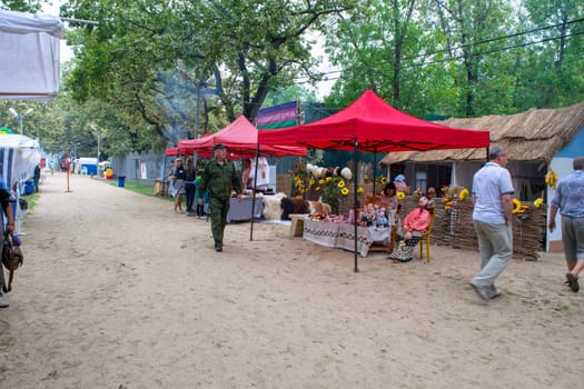 Slavyansk-on-Kuban, Russia - September 14, 2018: Day of the city of Slavyansk-on-Kuban, folk festivities in the city park. Representation of rural settlements in national traditions.