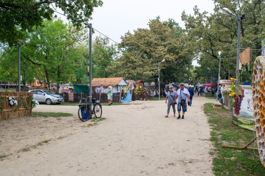 Slavyansk-on-Kuban, Russia - September 14, 2018: Day of the city of Slavyansk-on-Kuban, folk festivities in the city park. Representation of rural settlements in national traditions.