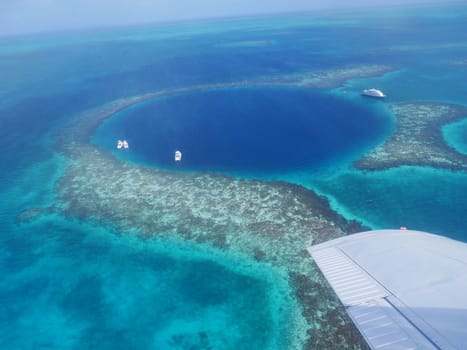 Sightseeing flight with a prop plane to the Barrier Reef in Belize to the famous Great Blue Hole