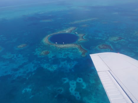 Sightseeing flight with a prop plane to the Barrier Reef in Belize to the famous Great Blue Hole