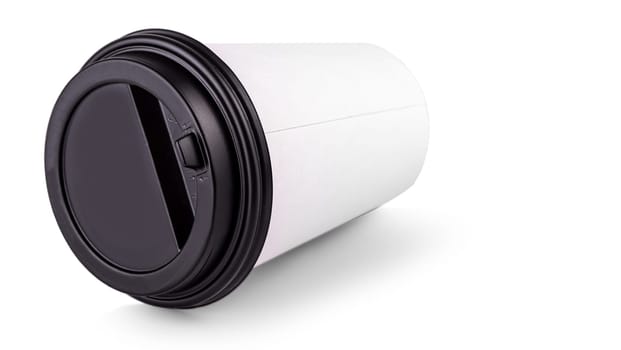 The white paper coffee cup with a black lid lies on white