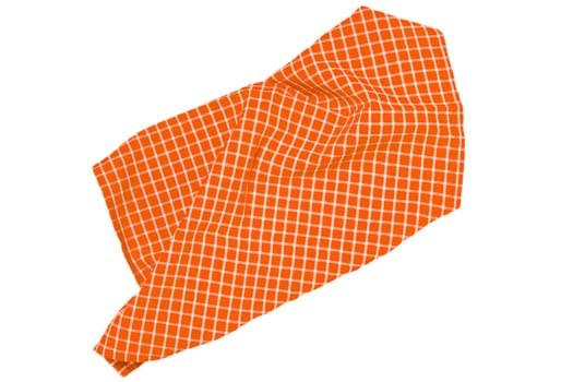 Towels isolated. Close-up of orange white plaid napkin or picnic tablecloth texture isolated on a white background. Kitchen accessories.