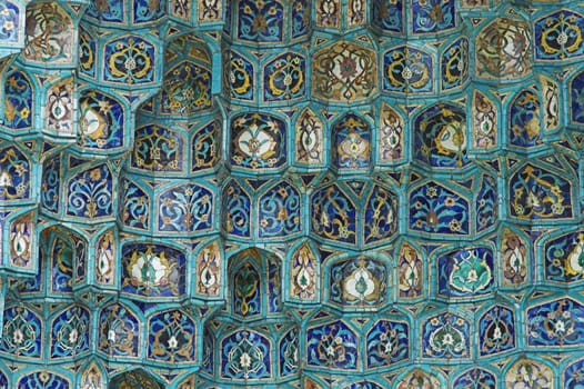 Fragment of a tiled wall with Arabic mosaic of an ancient mosque in Saint Petersburg, Russia.