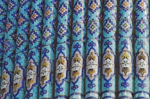 Fragment of a tiled wall with Arabic mosaic of an ancient mosque in Saint Petersburg, Russia.