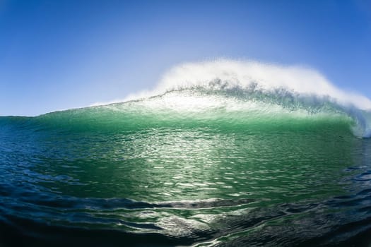 Ocean wave water crashing swell swimming surfing  morning backlight