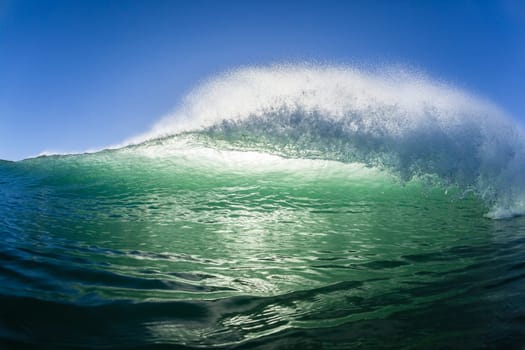 Ocean wave water crashing swell swimming surfing  morning backlight