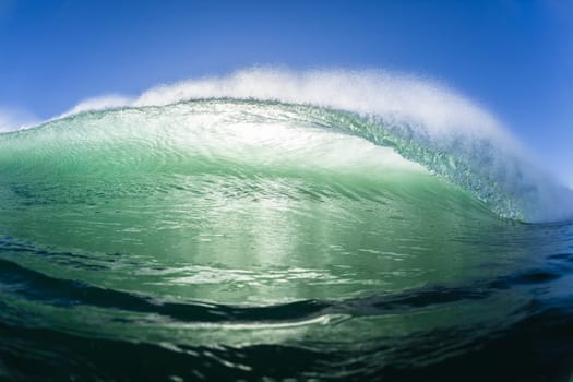 Ocean wave water crashing swell swimming surfing  morning backlight