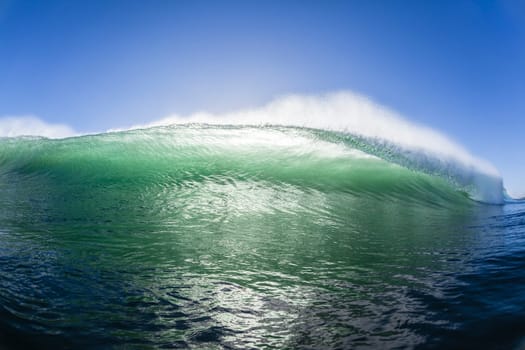 Ocean wave water crashing swell swimming surfing  morning backlight