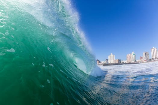 Ocean wave water crashing swell morning backlight