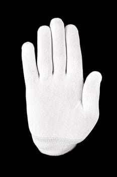 The white gloved hand on a black background. A hand in a white glove shows stop sign on a black background