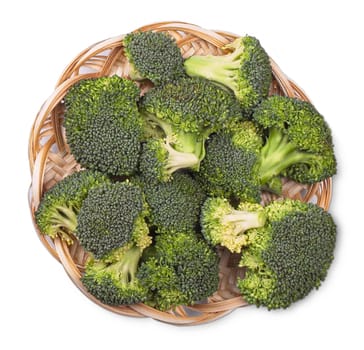 The Wooden bowl of broccoli on white background. Healthy green organic vegetable