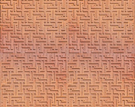 The Patterned metal abstract background. Selective focus