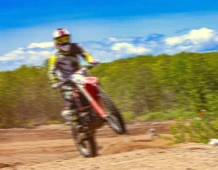 Kamchatka, Russia- 29 June 2019: Motocross riders practice tricks on their dirt bikes on a sunny day in Kamchatka