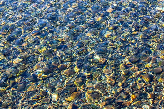 The texture transparent clear waters of the river
