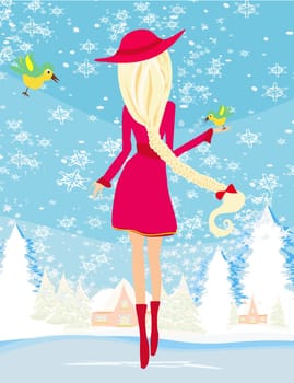 Girl feeds the birds in winter