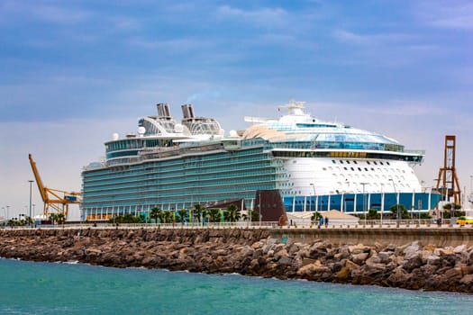 The large cruise ship and waterfront on the Mediterranean sea. Selective focus