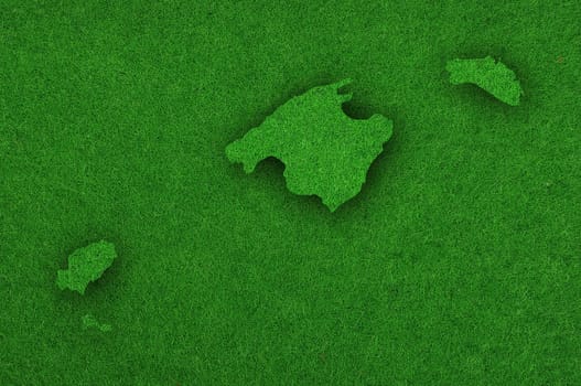 Map of Balearic Islands on green felt