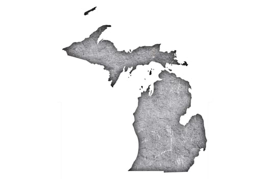 Map of Michigan on weathered concrete