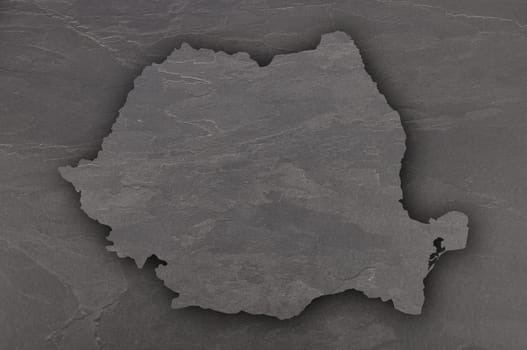 Map of Romania on dark slate