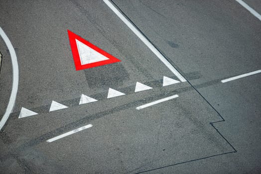 Sign painted on runway in airport. Traffic control for airplanes
