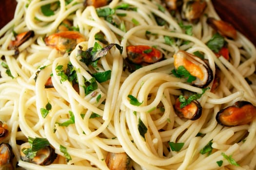 Spaghetti with mussels and clams, Mediterranean food, closeup