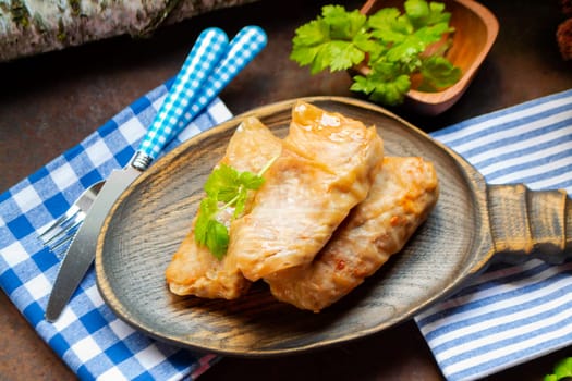 fried cabbage stuffed with meat on a rustic table