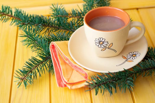 coffee hot cocoa cup or hot chocolate twigs spruce on the table new year mood