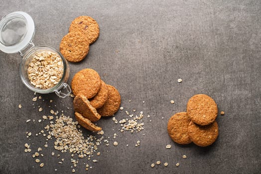 Homemade oatmeal cookies on grey table background. Healthy Food Snack Concept. Copy space