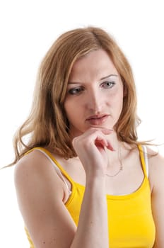 Head and shoulder portrait of a withdrawn young woman with bowed eyes holding her left hand to her cheek against a white background.