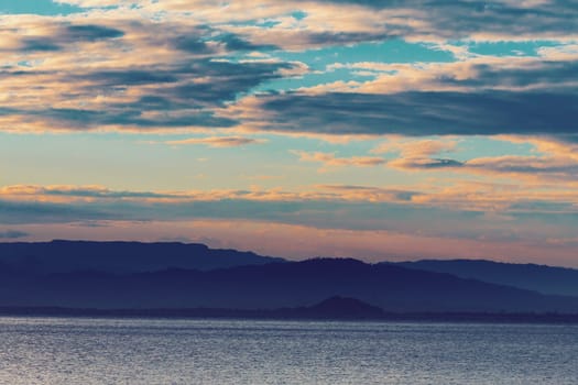 Idyllic sunset over indian ocean in Masoala national park. Madagascar paradise landscape. Wilderness virgin nature scene