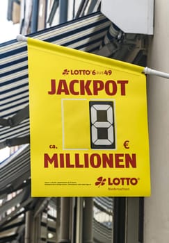Hannoversch Muenden, Germany - 18-07-2019 logo of JACKPOT LOTTO sign on a facade, sign of German Lotto.
