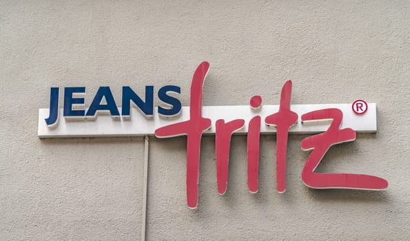 Hannoversch Muenden, Germany - 18-07-2019 logo of JEANS FRITZ sign on a facade, JEANS FRITZ is a big chain of stores for casual clothes.
